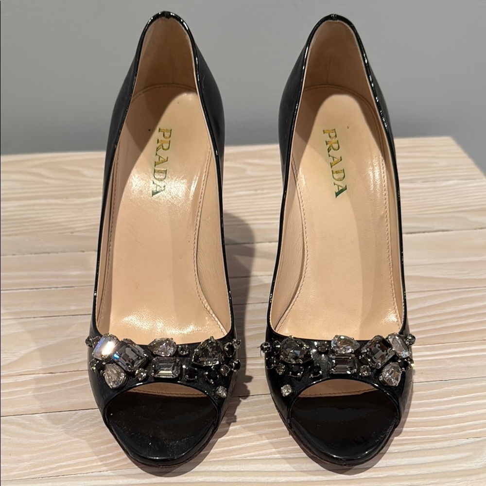 Prada Navy Heels with jeweled Embellishments. Open toed patent leather.